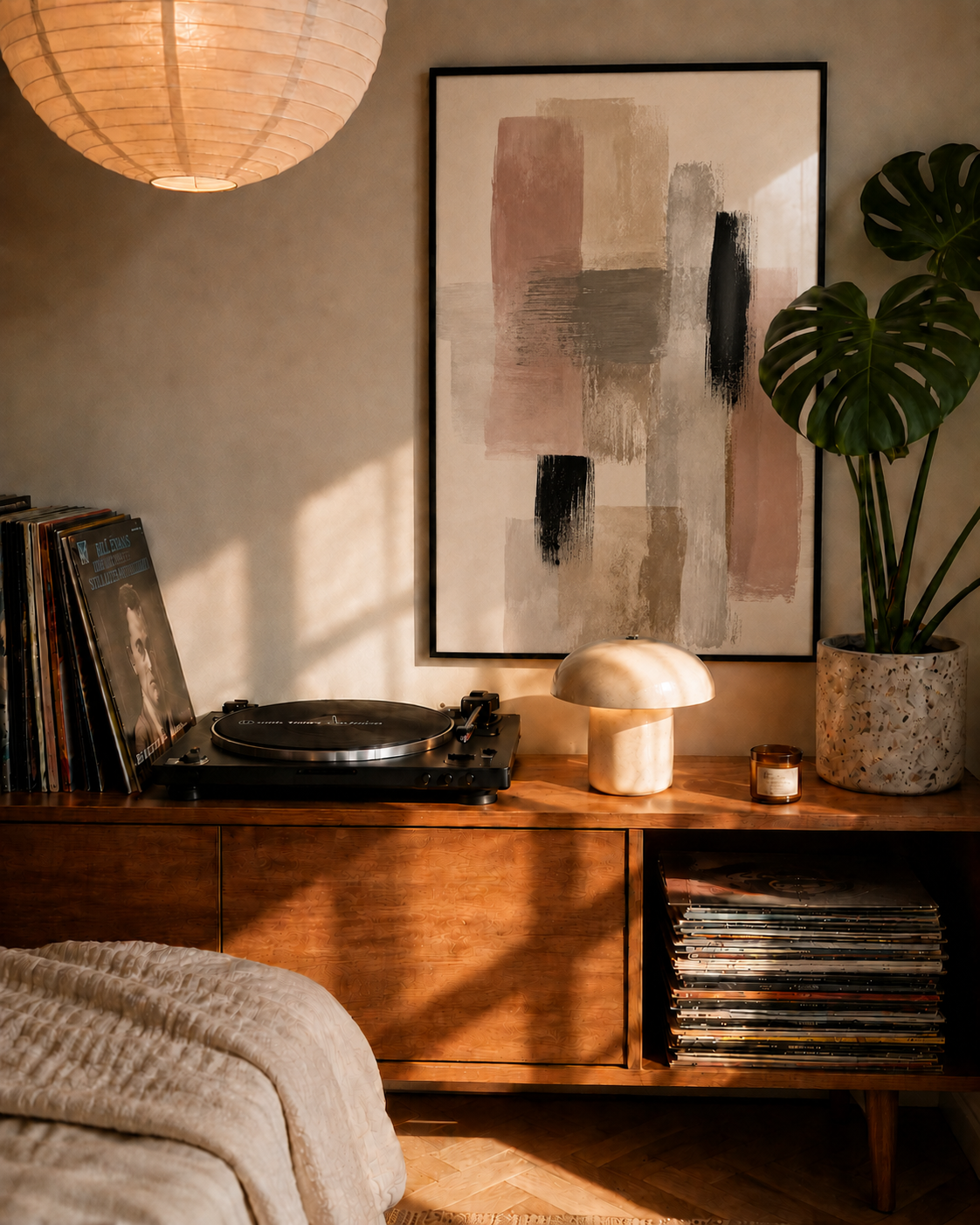 Abstract wall art in black frame with beige, gray, and black brush-stroke blocks