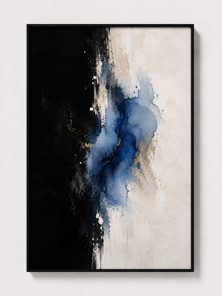 Abstract wall art in black frame with dark left side and blue ink splashes on white
