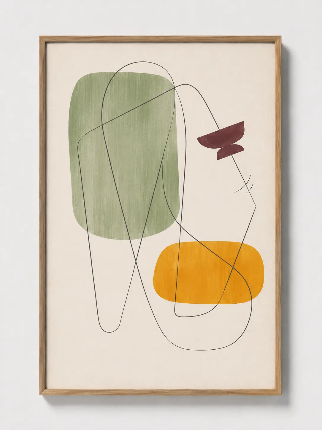 Oak-framed geometric wall art with green block, yellow shape, and dark contour line drawing