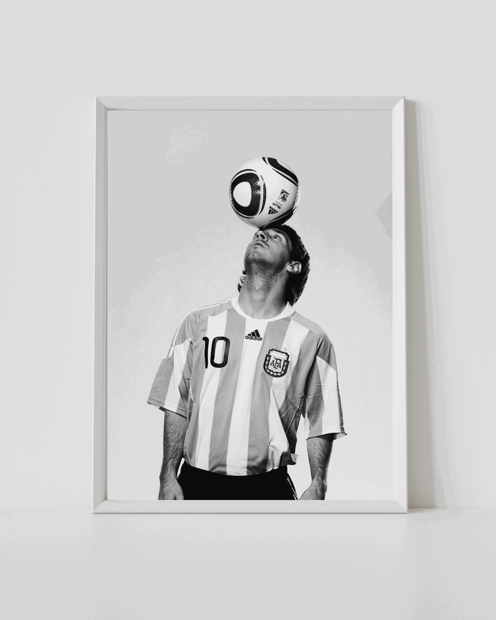 Framed white Argentina No.10 jersey poster with Messi and ball above head (black and white)