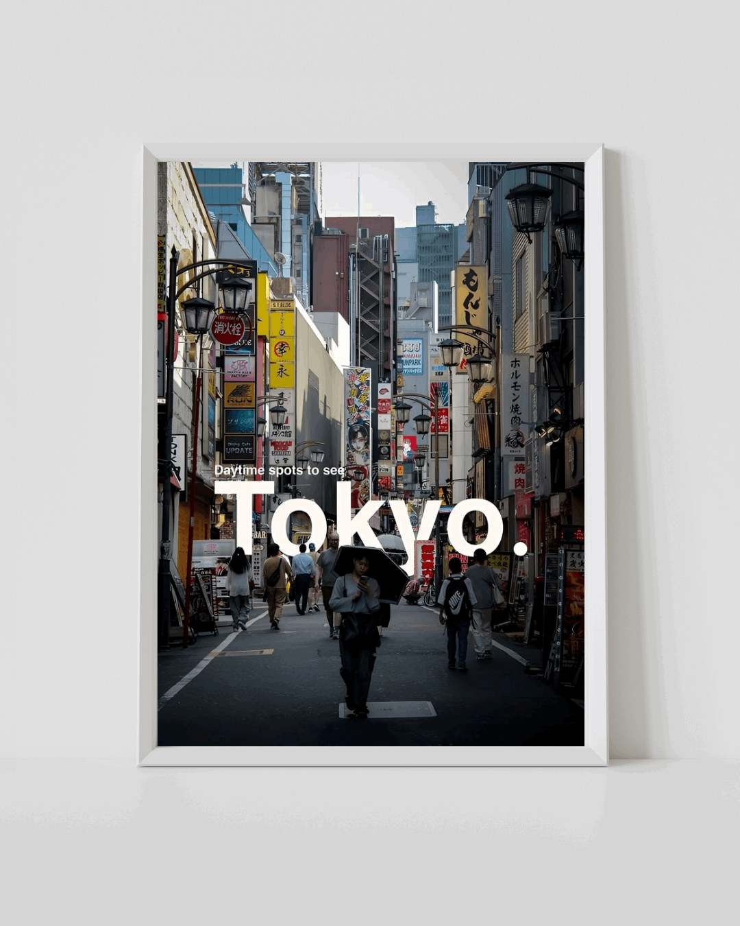 Framed Tokyo travel poster with street scene and large “TOKYO!” text