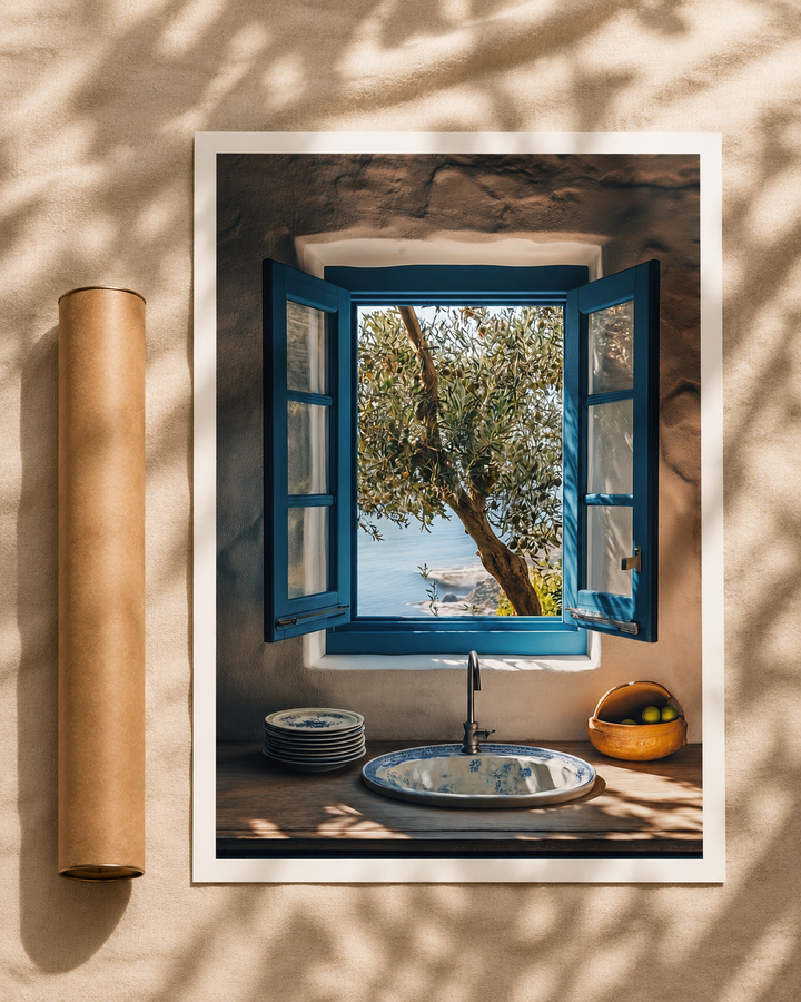 Olive Tree Window Print with an open blue wooden window overlooking an olive tree and the calm sea beyond.