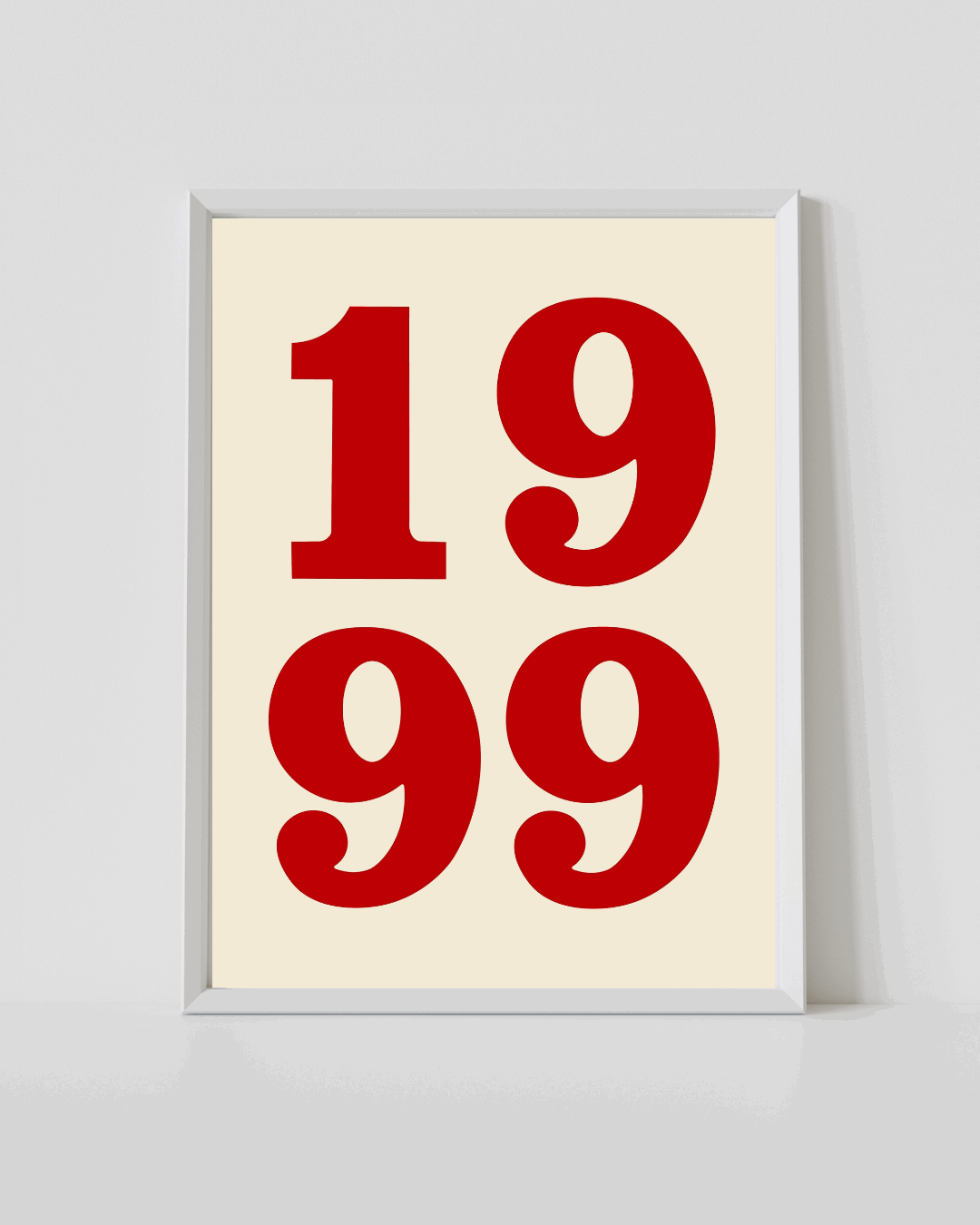 White-framed number typography print with red “1999” on cream background