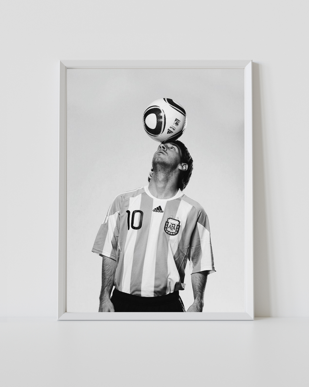 Lionel Messi black and white Argentina No.10 poster in a white frame