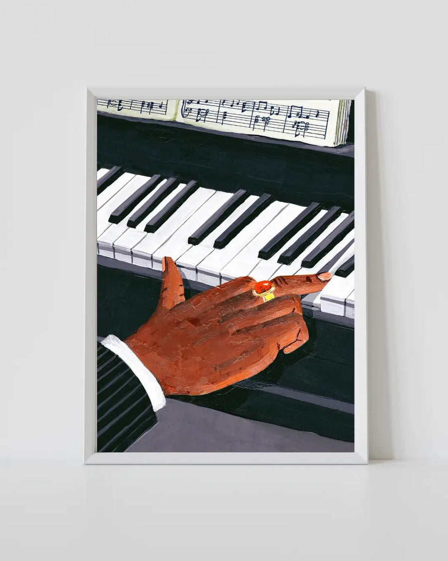 Impresión enmarcada de manos de piano con manos naranjas sobre teclas en blanco y negro