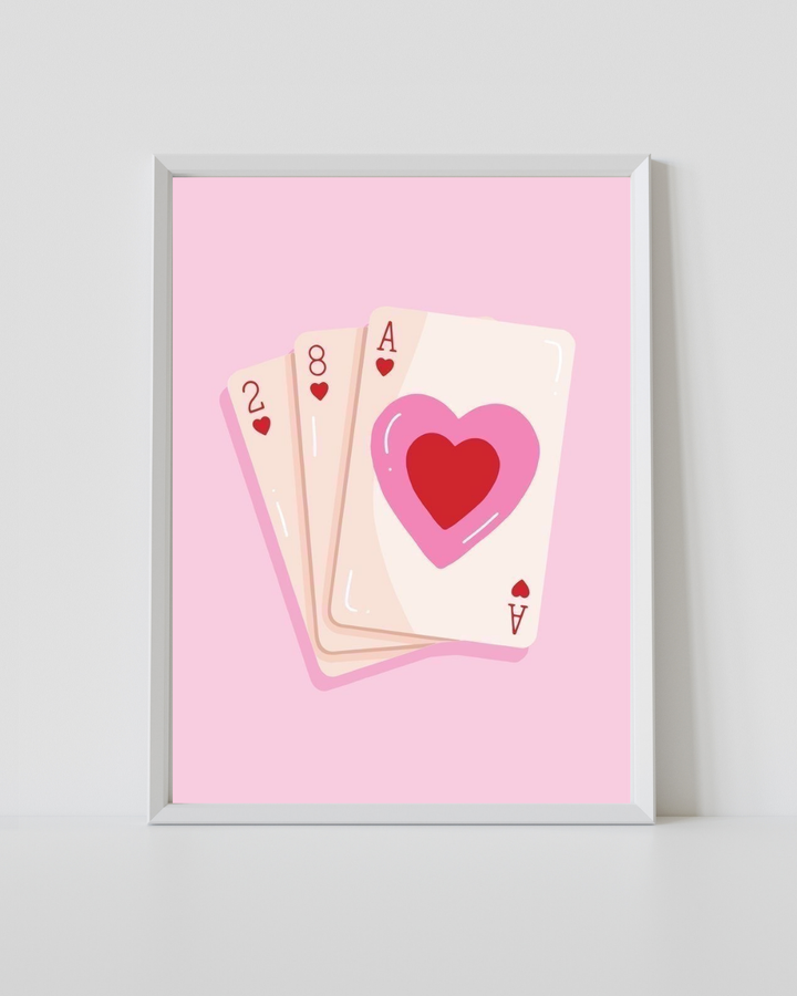 Pink Playing Cards Love Print featuring layered playing cards with a bold heart illustration on a soft pastel pink background.