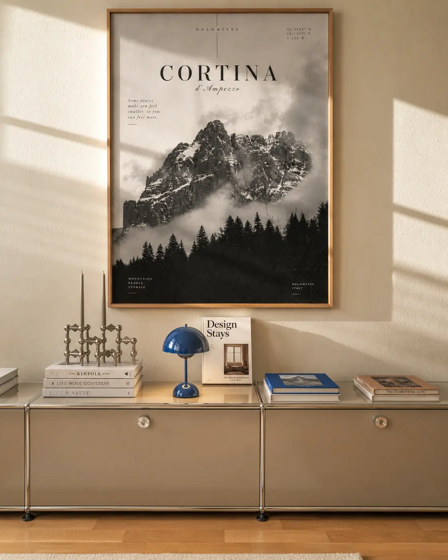 Cortina Mountain Art Print presented in a natural oak frame with rugged Dolomites peaks and atmospheric mountain mist