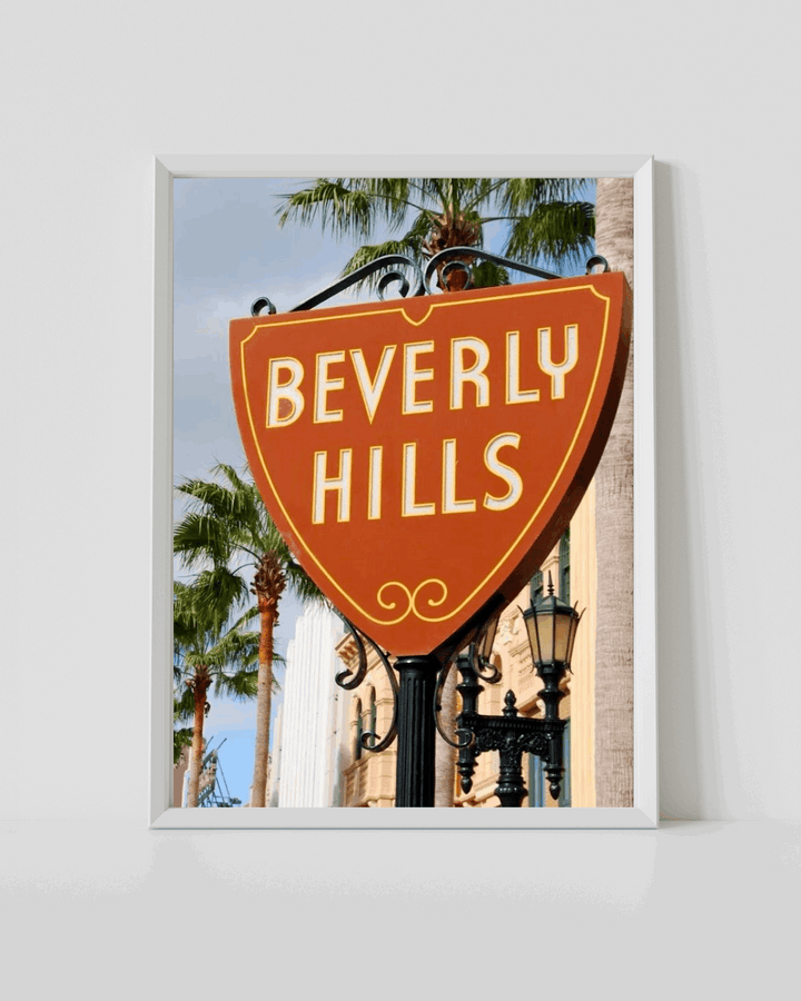 Beverly Hills sign wall art with white frame and orange “BEVERLY HILLS” lettering