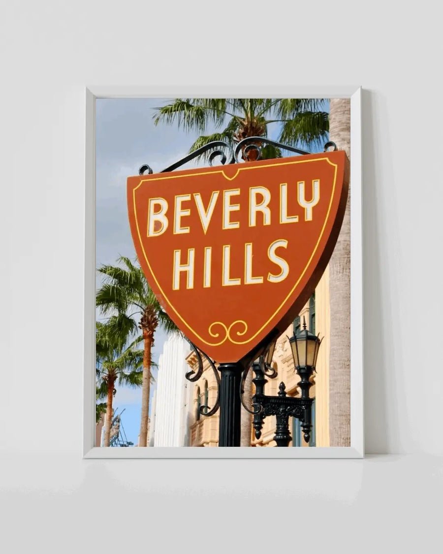 Beverly Hills sign wall art with white frame and orange “BEVERLY HILLS” lettering