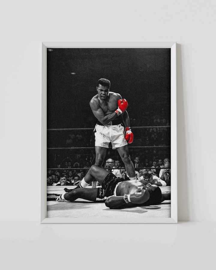 White-framed boxing poster with monochrome Ali throwing punches, red gloves