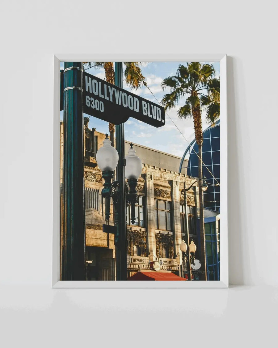 White-framed wall art featuring Hollywood Blvd sign and street lampposts