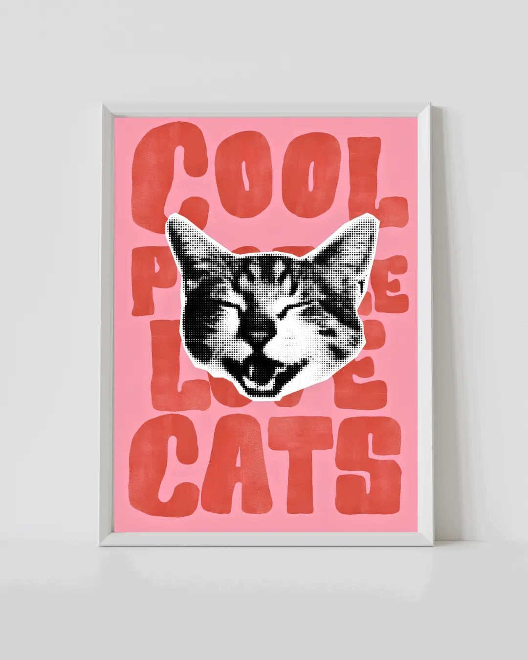 White-framed wall art poster with black-and-white cat over red lettering