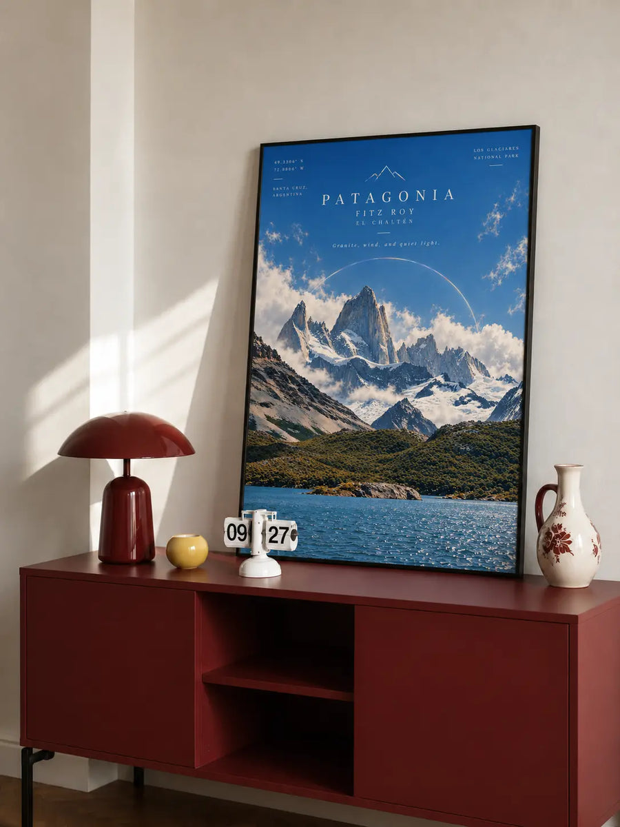 Patagonia Alpine Lake Print featuring snow covered peaks beyond a clear blue mountain lake and open valley terrain