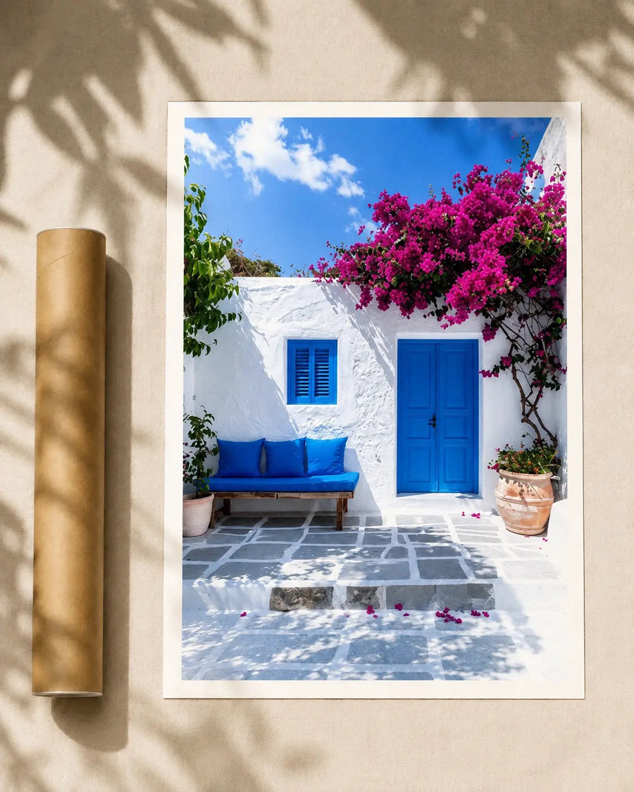 Bougainvillea courtyard print in a light frame, showing blue door and pink flowers