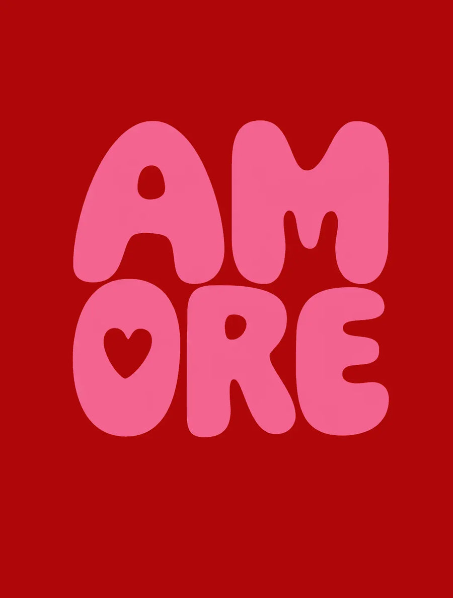 Red typographic print close-up with large pink letters and a heart