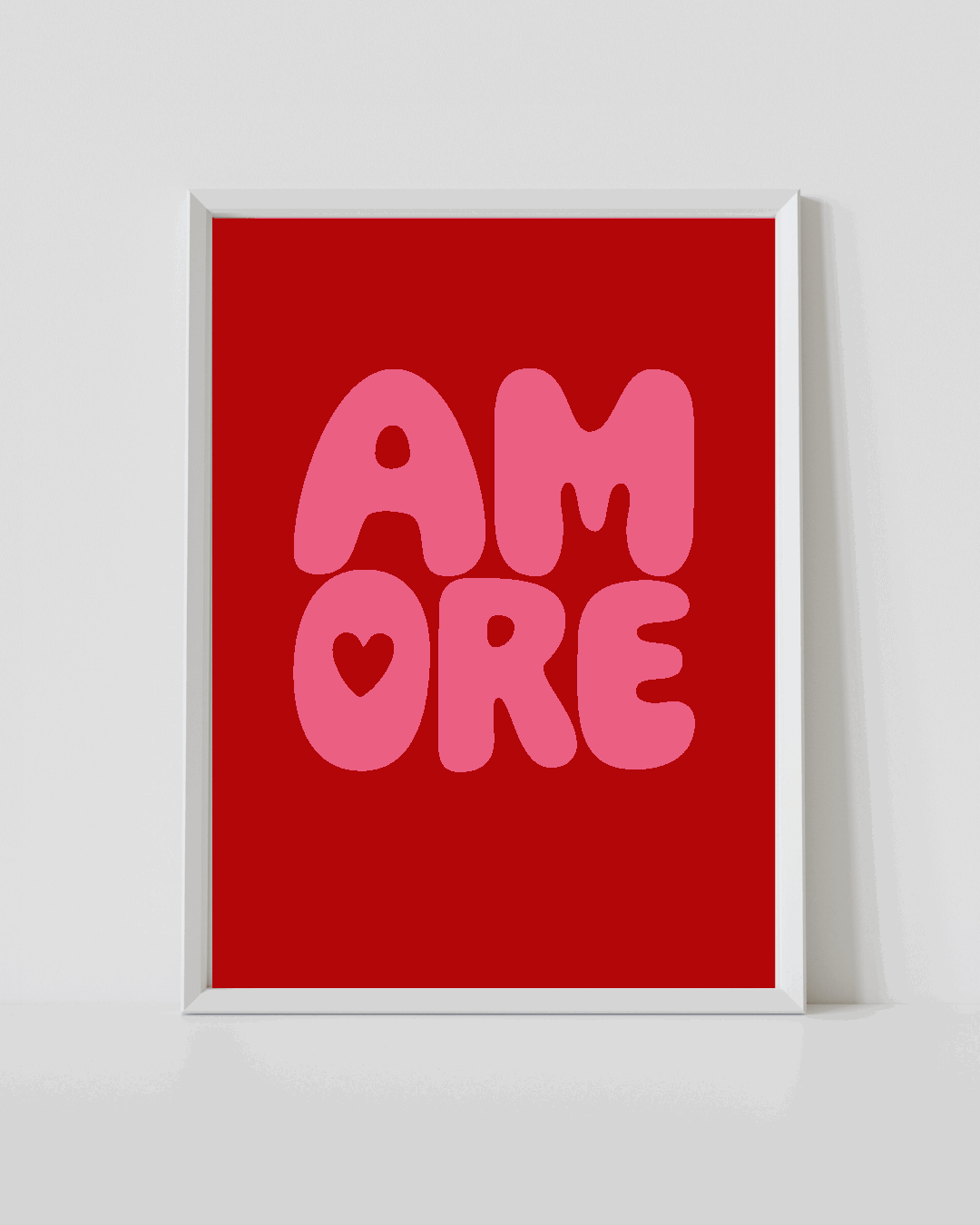 Red typographic poster with pink lettering and heart, in a white frame