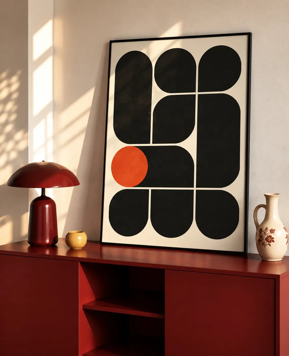 Framed Bauhaus art print with black rounded blocks, white grid lines, and an orange circle.