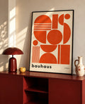 Black-framed Bauhaus-style art print with orange geometric shapes and 'bauhaus 1923'