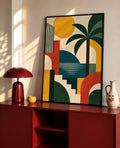 Framed palm tree art print with bold geometric shapes in a black frame
