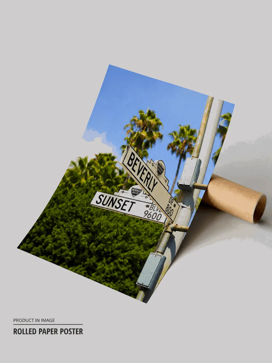 Rolled paper poster with street sign artwork, palm trees, and blue sky