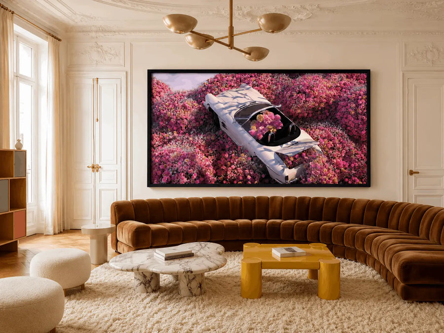 Framed floral wall art print with light-blue car in pink flower field