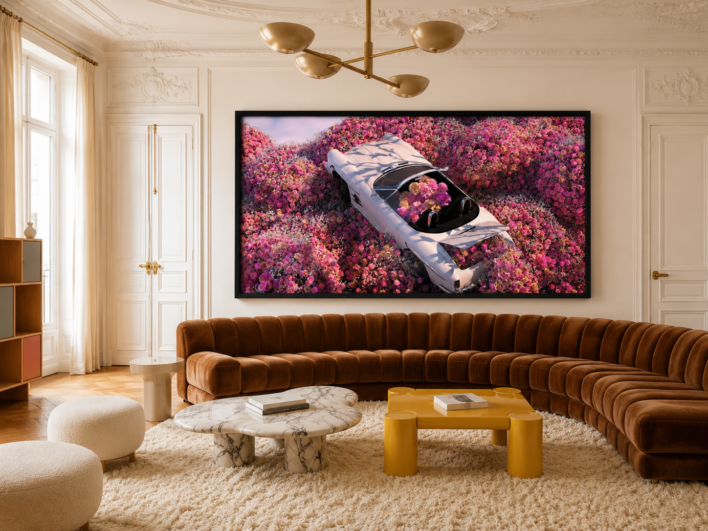 Black-framed wall art print of a silver car in a pink flower field