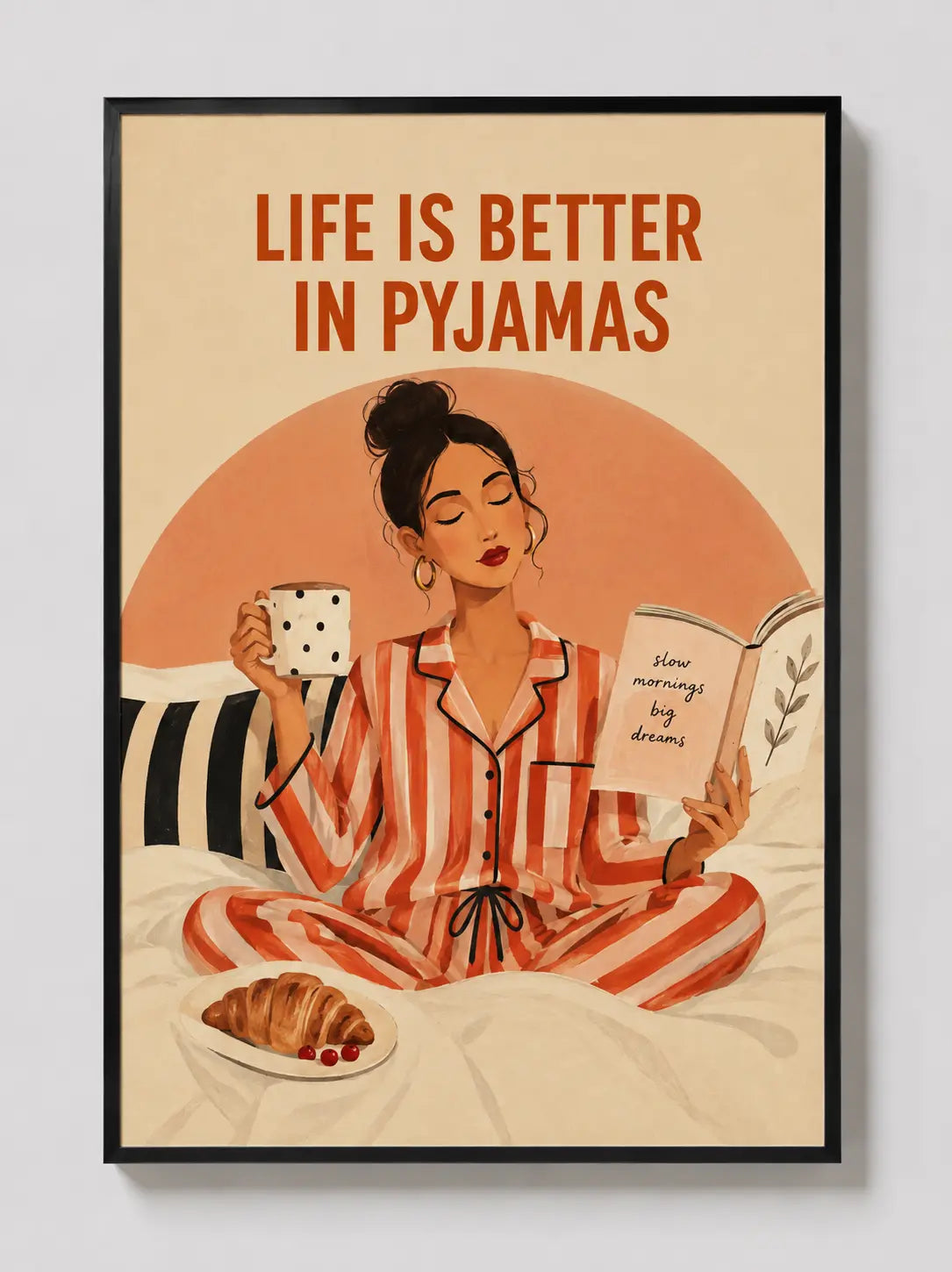 Framed wall art poster with woman in striped pajamas, text “Life is Better in Pyjamas”