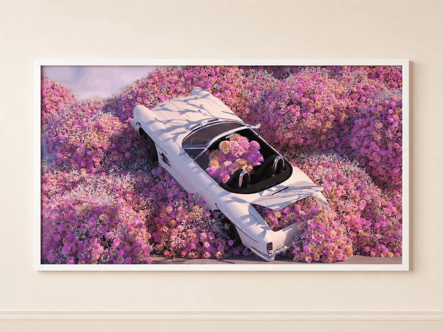 Framed floral wall art with light-blue car angled in pink blossoms