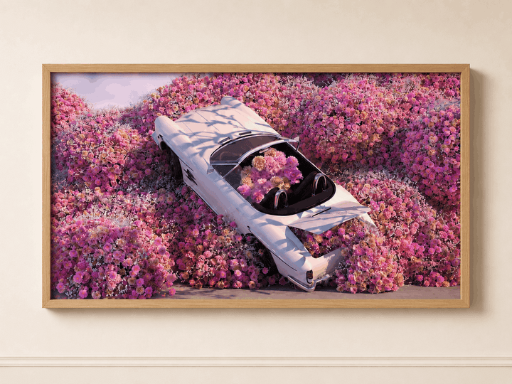 Wood-framed floral wall art featuring light-blue car among pink flowers
