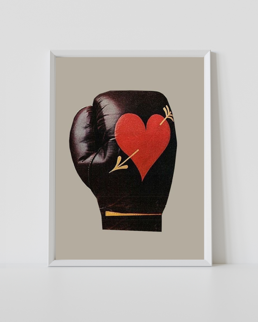 Boxing Love Print featuring a black boxing glove with a red heart pierced by an arrow on a neutral background.