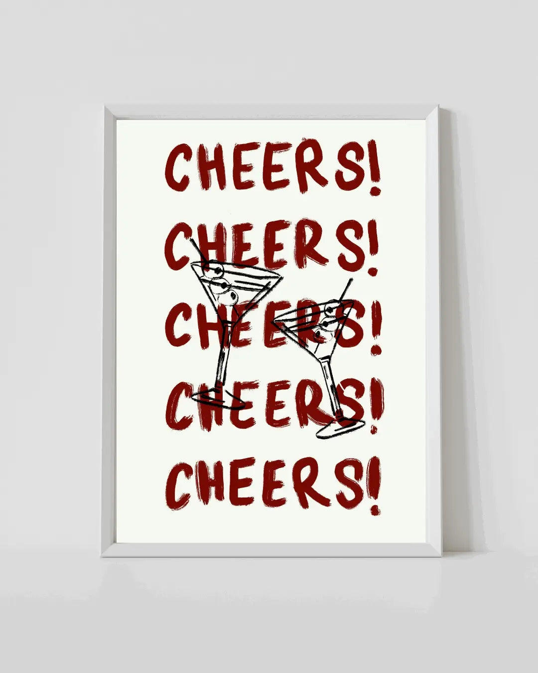 Framed cocktail cheers print with repeated red 'CHEERS!' text and martini glass silhouettes
