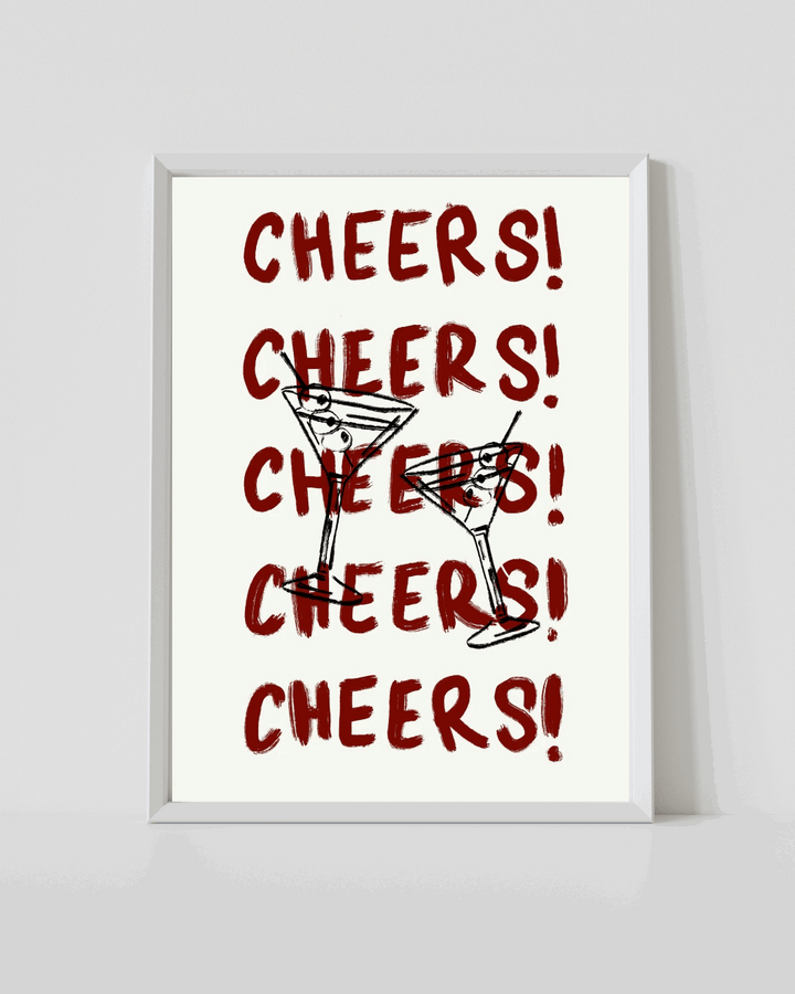 Framed cocktail cheers print with repeated red 'CHEERS!' text and martini glass silhouettes