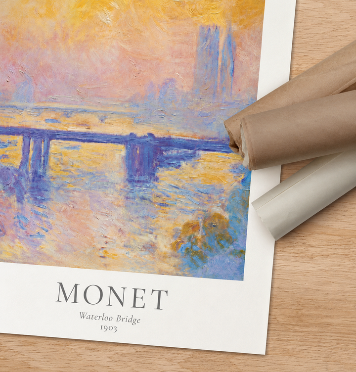 Waterloo Bridge art print with Monet caption, partially rolled edge beside wooden backing