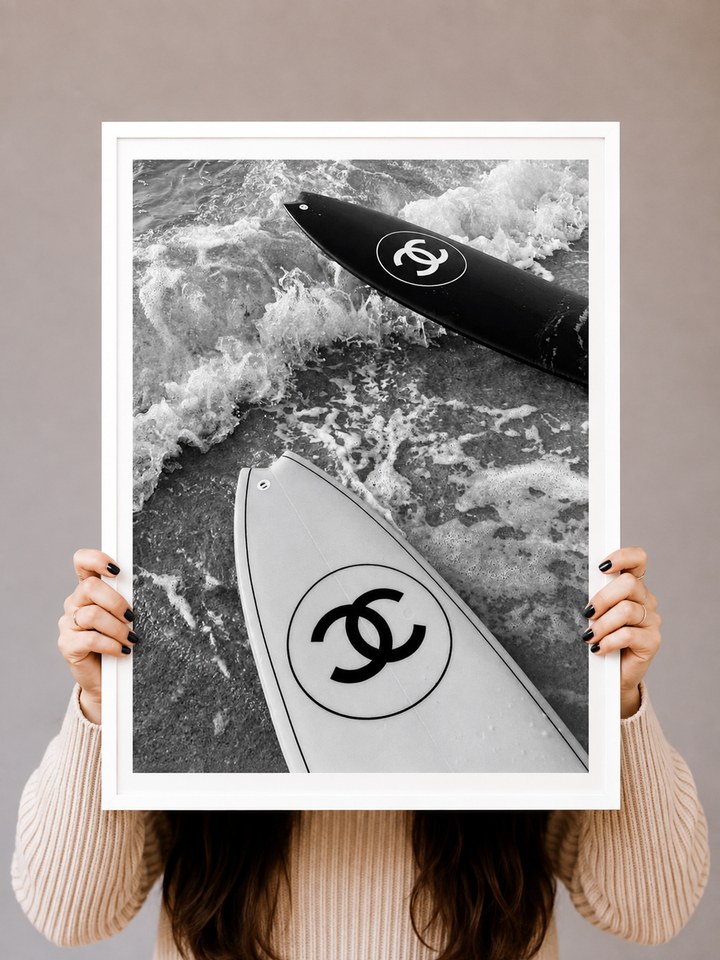 Surfboard Art Print showing an overhead view of a board cutting through moving coastal water