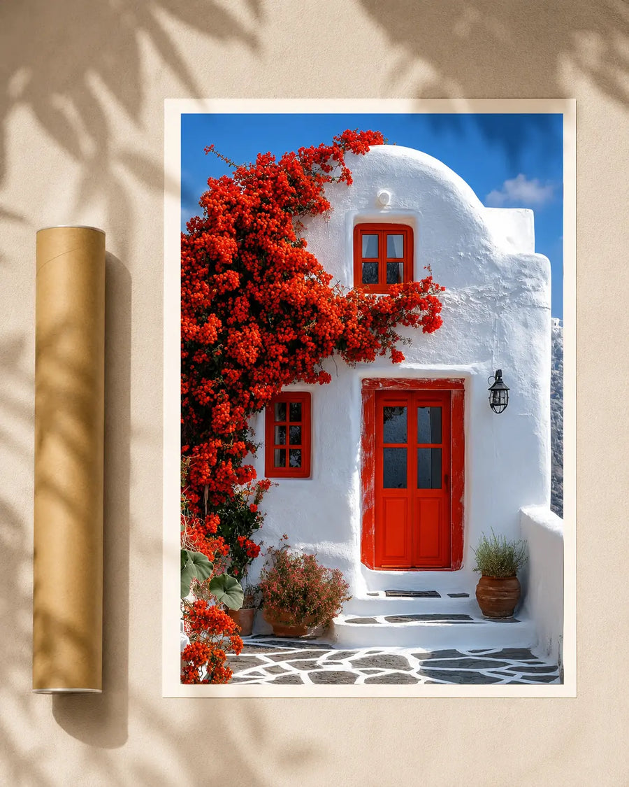 Santorini doorway print with red doors, white building facade, and red flowering tree