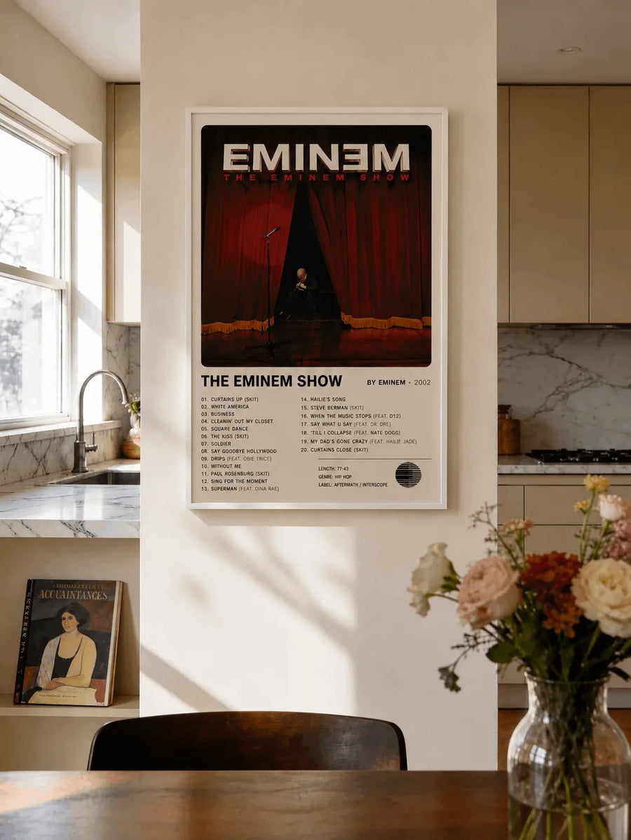Framed rap music wall print with white border on wall, curtain stage artwork and text