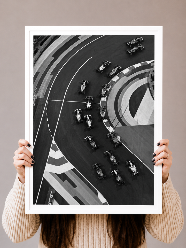 F1 Circuit Art Print with black and white race cars gathered across a geometric circuit layout