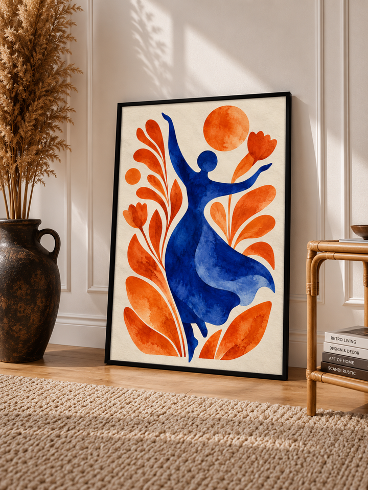 Botanical Woman Watercolor Print displayed in a slim black frame within a calm neutral living space