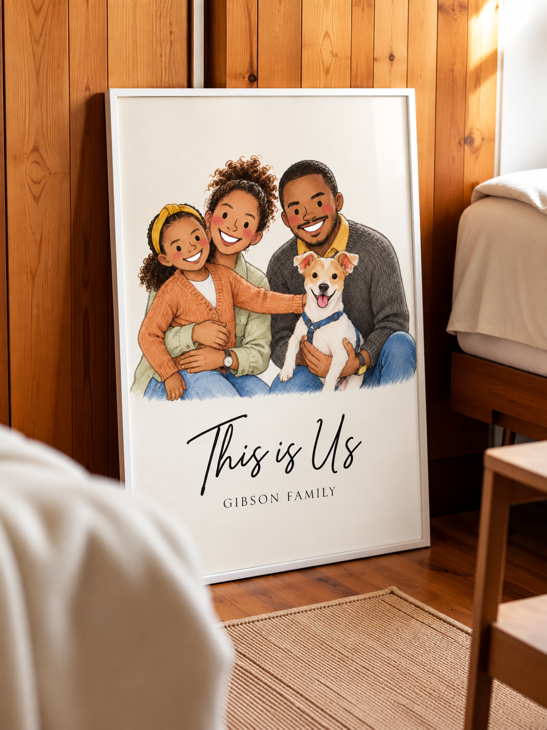 White framed family portrait wall art with dog; 'This is Us' and 'Gibson Family'