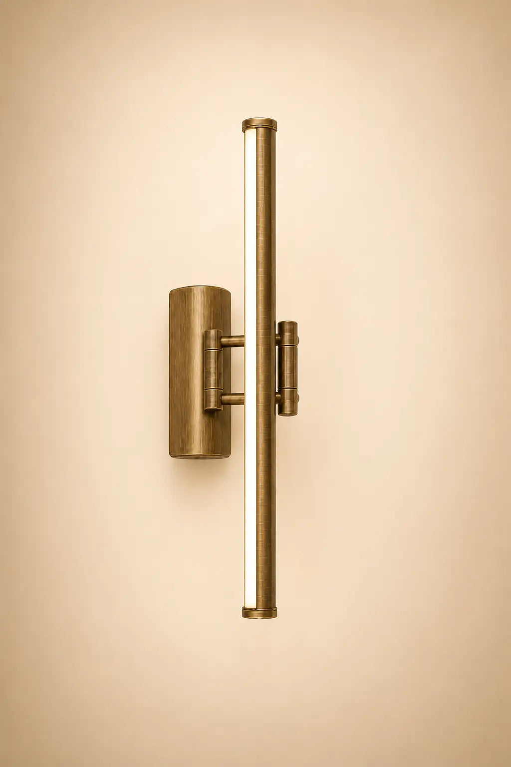 Gold metal wall light with vertical bar and two small side light modules