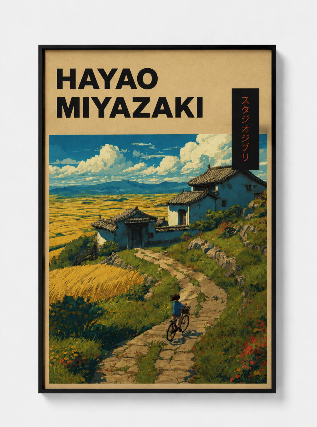 Framed Hayao Miyazaki art print showing countryside path, bicycle, and houses