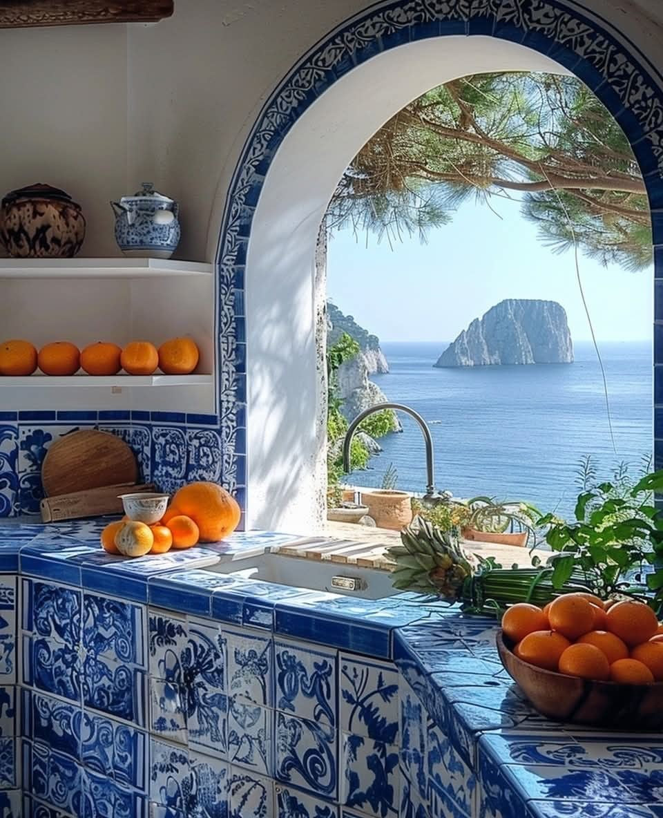 Coastal Window Print showing a blue tiled interior, coastal landscape, and natural light streaming through an open archway.