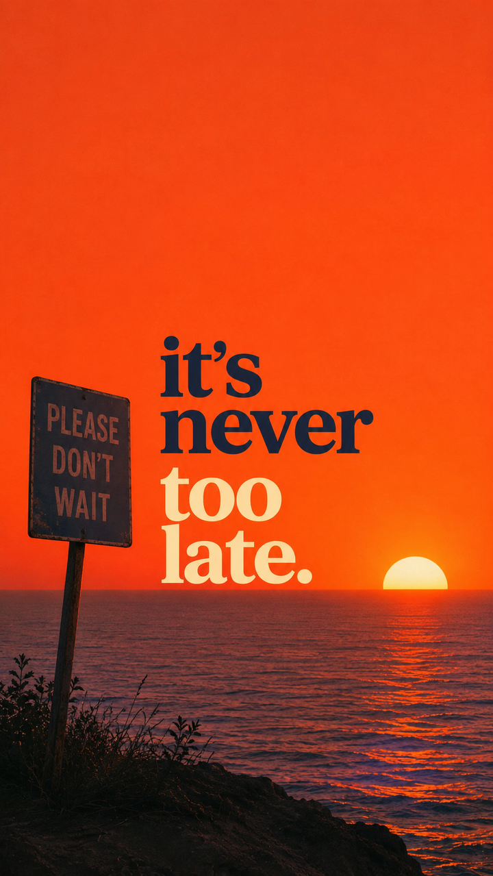 Orange motivational wall art with “it’s never too late” quote and sunset horizon.