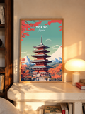 Framed wall art of Tokyo pagoda, orange maple trees and teal sky with Japan text