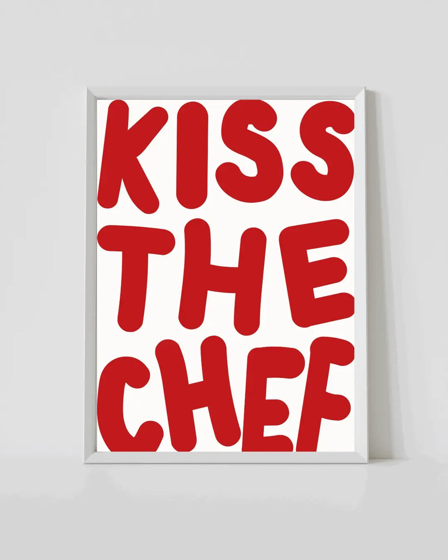 Framed kitchen typographic print with red 'KISS THE CHEF' text on white background