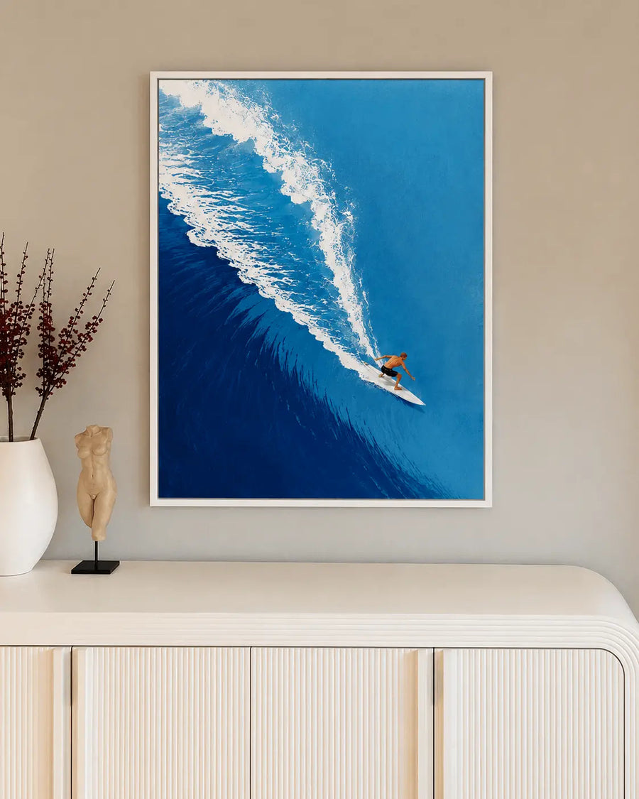 Azure Surf wall art with white frame, blue ocean wave scene and surfer on surfboard