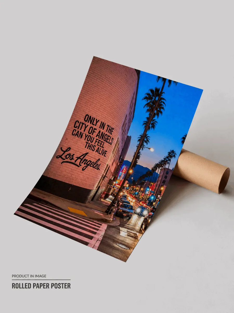 Rolled city street wall art print with brick wall quote and palm trees at dusk