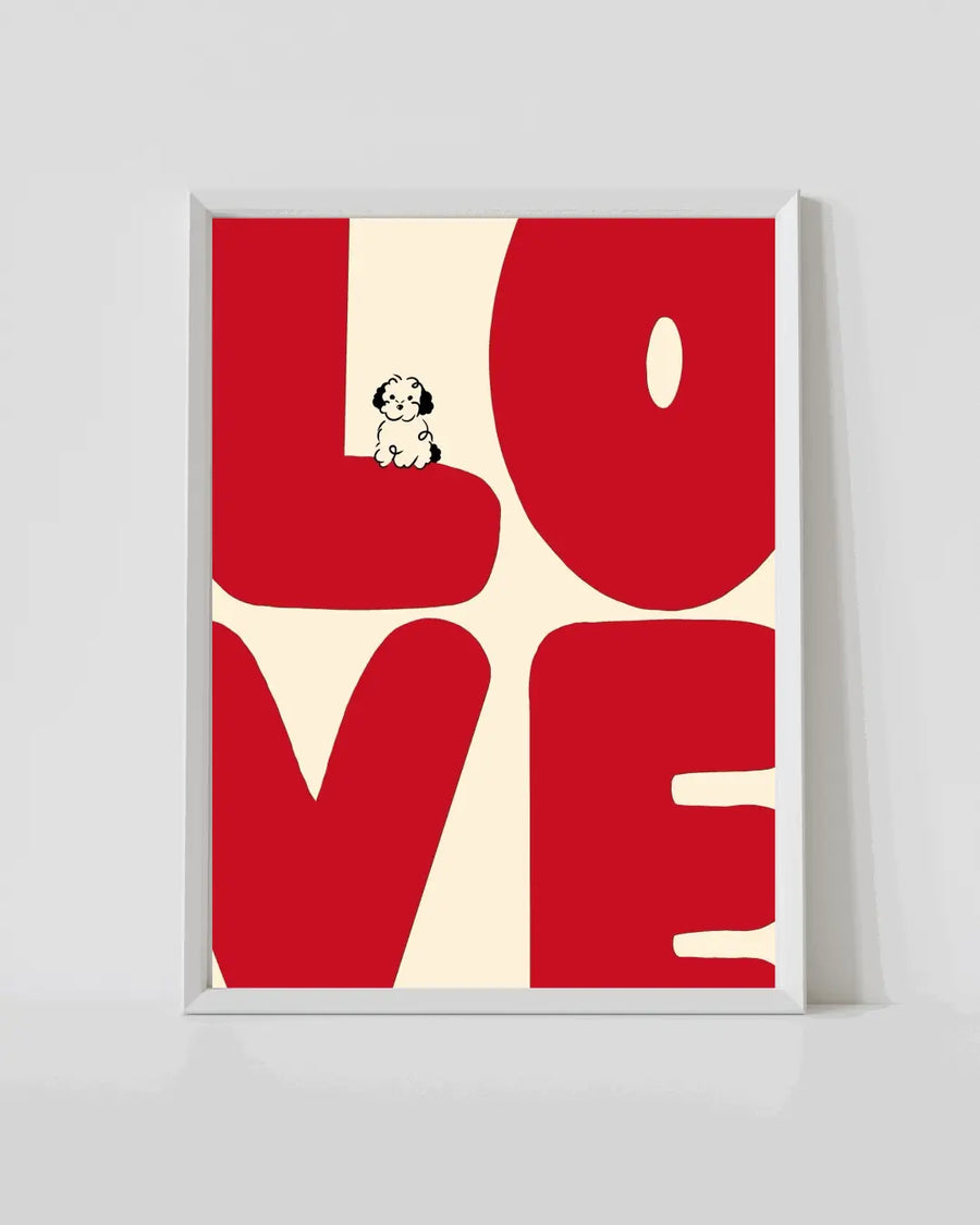 Framed LOVE typography print with red letters on cream background