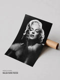 Rolled black-and-white Marilyn Monroe poster with portrait and hand near her face