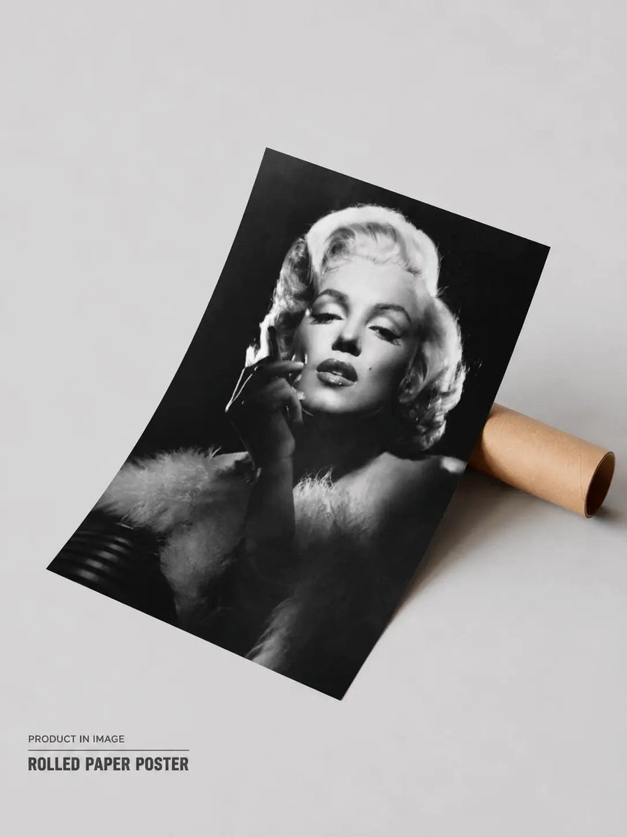 Rolled black-and-white Marilyn Monroe poster with portrait and hand near her face